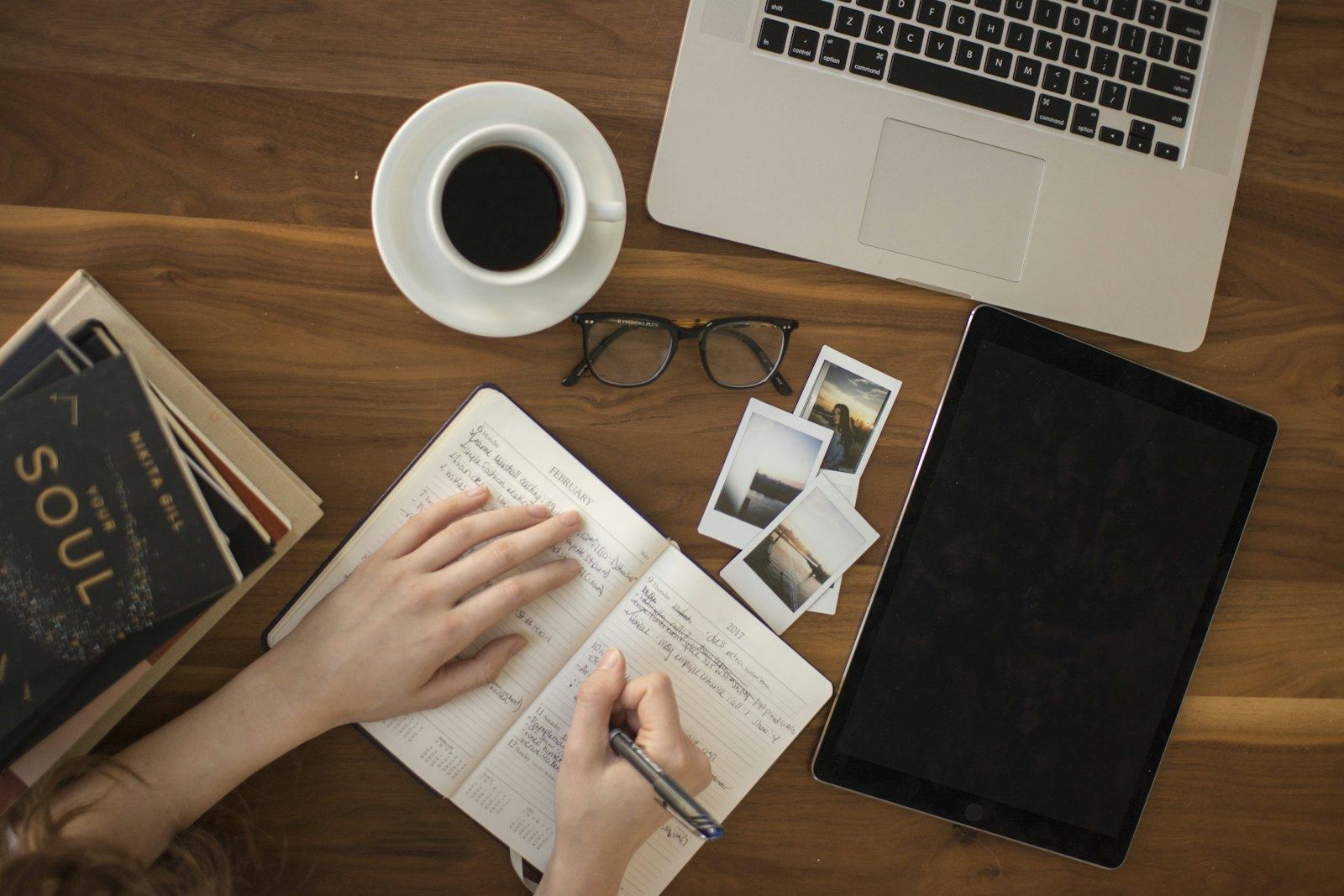 A notebook and papers on a desk